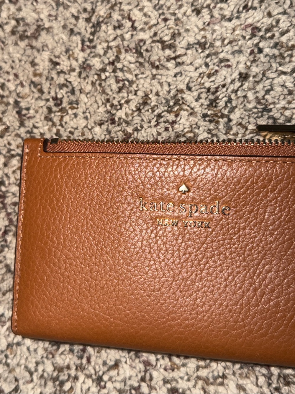 kate spade tan pebbled leather zip wallet with gold logo